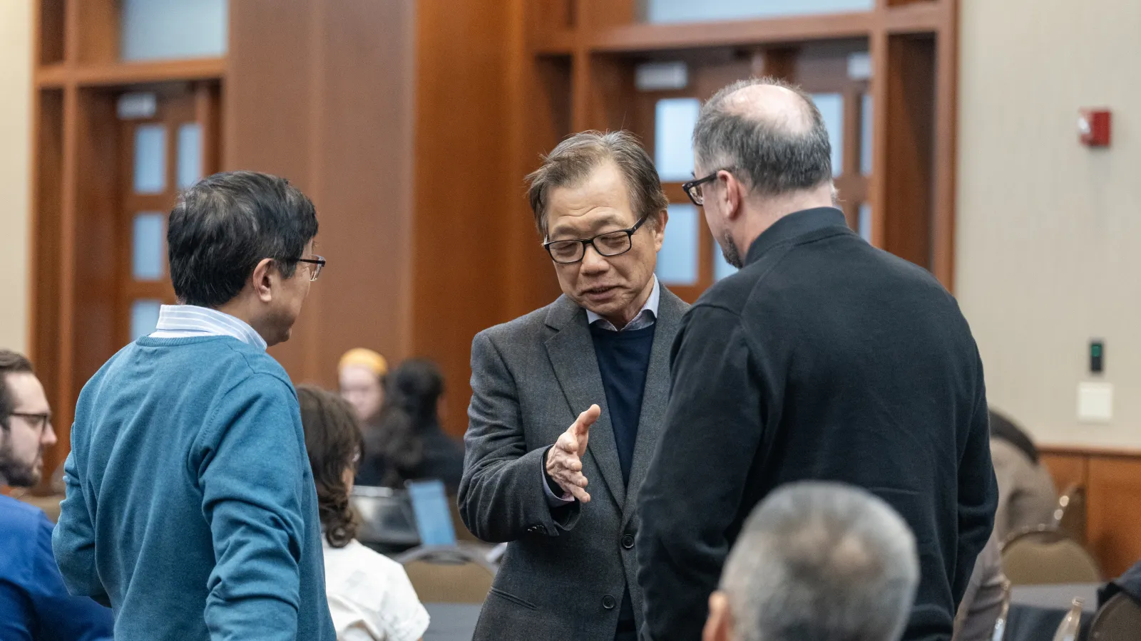 OSU AI research summit day 1 attendees talking